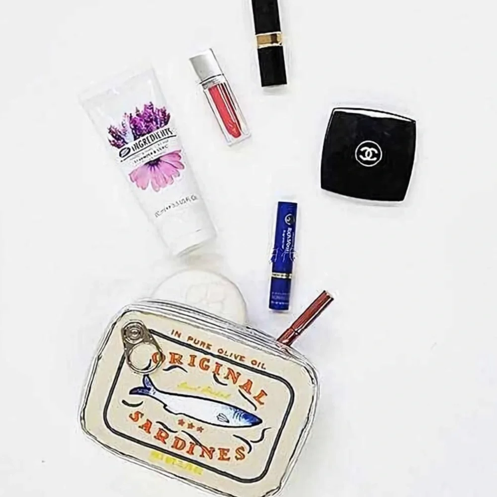 Campy and cute Sardine Can clutch cream & silver zip closure